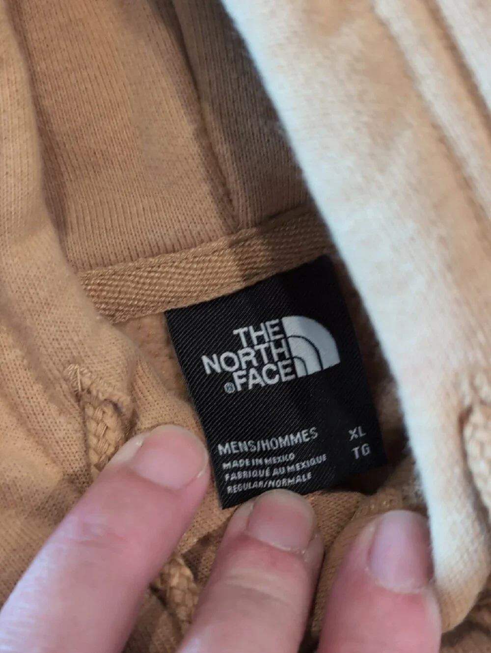 The North Face tan/beige pullover hoodie with logo tag